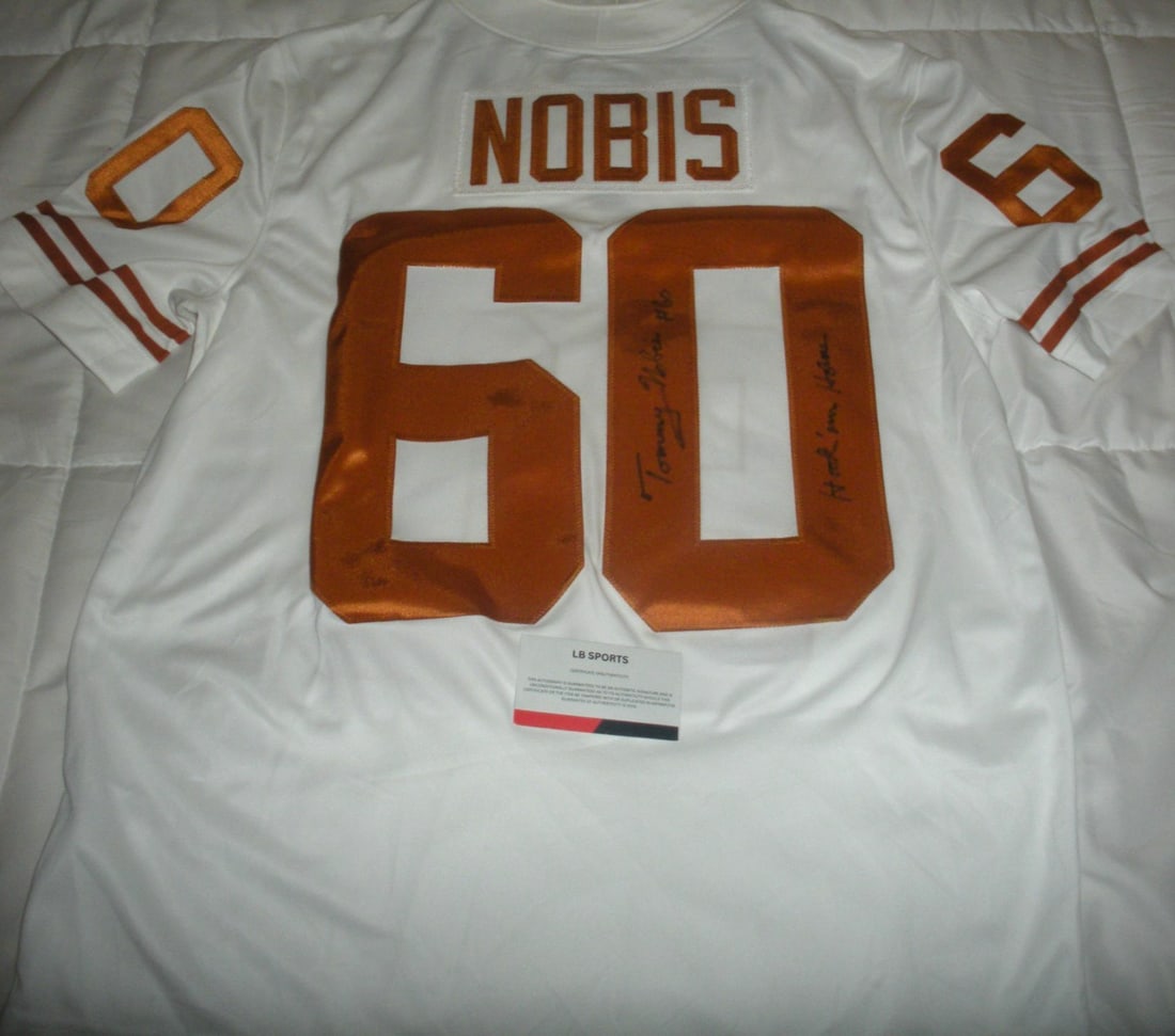 Nike Texas Longhorns Official Licensed Jersey Signed by Tommy Nobis with COA: Nike Texas Longhorns Official Licensed Jersey Signed by Tommy Nobis with COA Official licensed Nike jersey featuring Tommy Nobis and Texas Longhorns Hook'em branding. This original football jersey is 