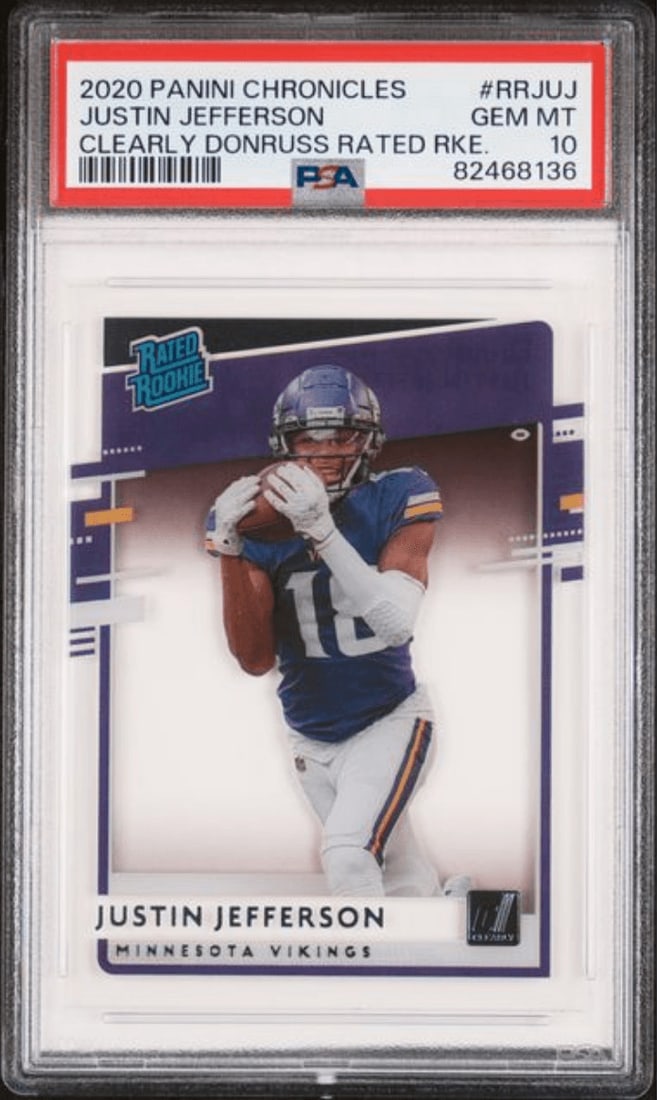 PSA 10 Justin Jefferson RRJUJ 2020 Panini Chronicles Rated Rookie Card: PSA 10 Justin Jefferson RRJUJ 2020 Panini Chronicles Rated Rookie Card Graded 2020 Panini Chronicles Justin Jefferson #RRJUJ Clearly Donruss Rated Rookie football card. This PSA 10 sports trading card