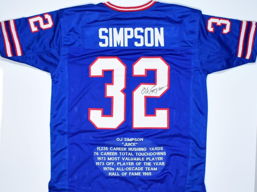 Buffalo Bills O.J. Simpson Signed Blue STAT Football Jersey JSA: Buffalo Bills O.J. Simpson Signed Blue STAT Football Jersey JSA Autographed blue pro style football jersey featuring O.J. Simpson and the Buffalo Bills. The jersey is marked original, signed, and made