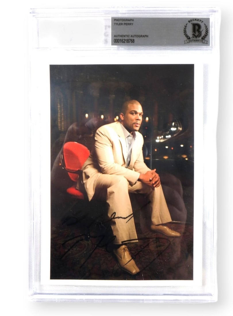 Tyler Perry Signed 5X7 Photograph Authenticated by JSA in Protective Case: Tyler Perry Signed 5X7 Photograph Authenticated by JSA in Protective Case This is an original 5x7 photograph signed by Tyler Perry, renowned writer and director. The photo is encased and authenticated