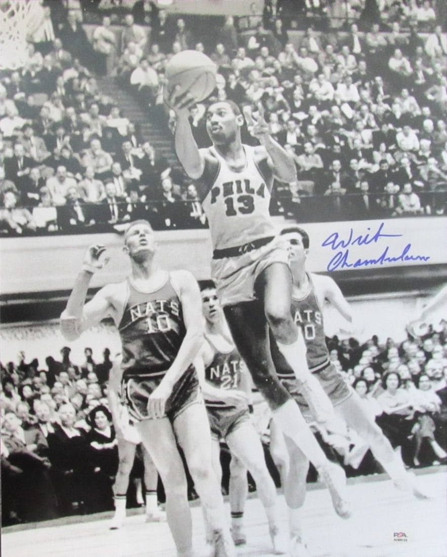 Wilt Chamberlain Autographed 16x20 Sixers Photo with PSA DNA Gem Mint 10: Wilt Chamberlain Autographed 16x20 Sixers Photo with PSA DNA Gem Mint 10 This stunning black-and-white 16"x20" photograph features the legendary Wilt Chamberlain, personally signed by the basketball i