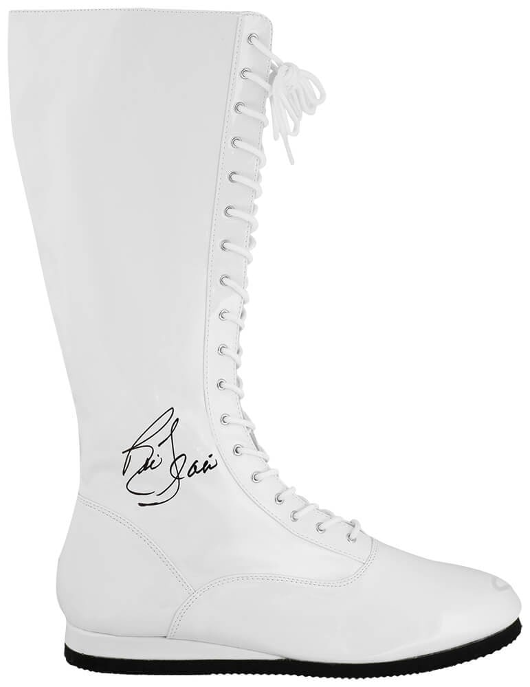 Signed White Wrestling Boot Ric Flair JSA COA: Signed White Wrestling Boot Ric Flair JSA COA This is a white wrestling costume boot signed by Ric Flair. The autograph is accompanied by a tamper-evident, numbered JSA (James Spence Authentication) C