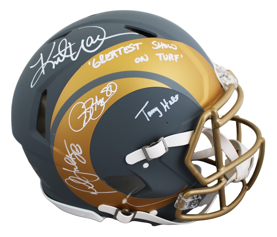 Los Angeles Rams F S Speed Proline Helmet signed by 4 BAS witnessed: Los Angeles Rams F S Speed Proline Helmet signed by 4 BAS witnessed Autographed Los Angeles Rams alternate slate Riddell authentic full-size Speed Proline helmet signed by Isaac Bruce, Kurt Warner, Ma