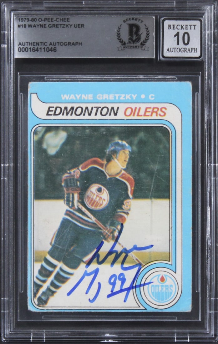 Wayne Gretzky Signed 1979 O-Pee-Chee Rookie Card Gem Mint 10 Beckett: Wayne Gretzky Signed 1979 O-Pee-Chee Rookie Card Gem Mint 10 Beckett This is a stunning 1979 O-Pee-Chee #18 rookie card featuring Wayne Gretzky, personally signed by the legendary player himself. Grad