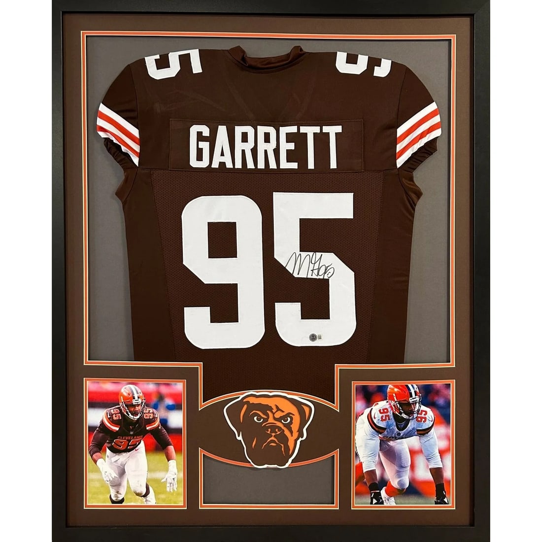 Framed Cleveland Browns Jersey Signed by Myles Garrett Beckett Authenticated: Framed Cleveland Browns Jersey Signed by Myles Garrett Beckett Authenticated Framed Cleveland Browns jersey signed by Myles Garrett. This pre-owned display piece includes Beckett authentication with a