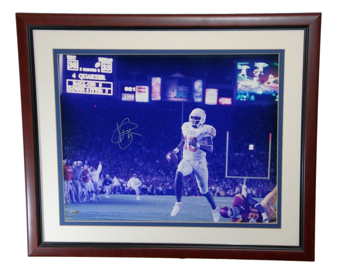 Framed 20x16 Signed Vince Young Texas Longhorns Photo TRISTAR: Framed 20x16 Signed Vince Young Texas Longhorns Photo TRISTAR Framed 20x16 photo featuring Vince Young and the "4th and 5" Texas Longhorns moment. This original signed football collectible is authenti
