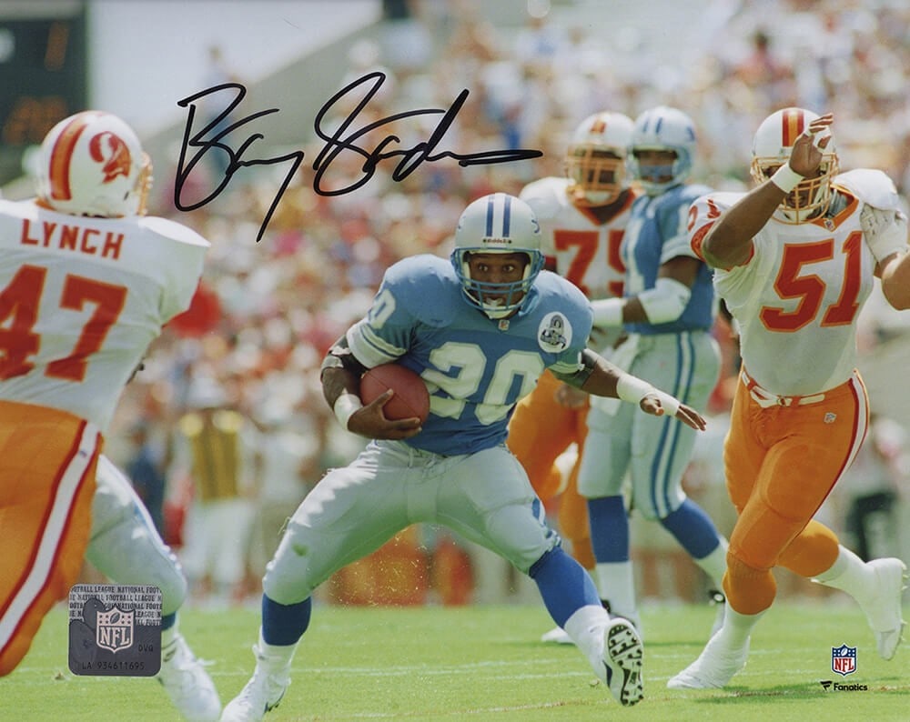 Barry Sanders Signed 8x10 Photo Detroit Lions vs Bucs - SS COA: Barry Sanders Signed 8x10 Photo Detroit Lions vs Bucs - SS COA Celebrate the legacy of Barry Sanders with this signed 8x10 action photo featuring the Detroit Lions vs. Tampa Bay Buccaneers. This origi