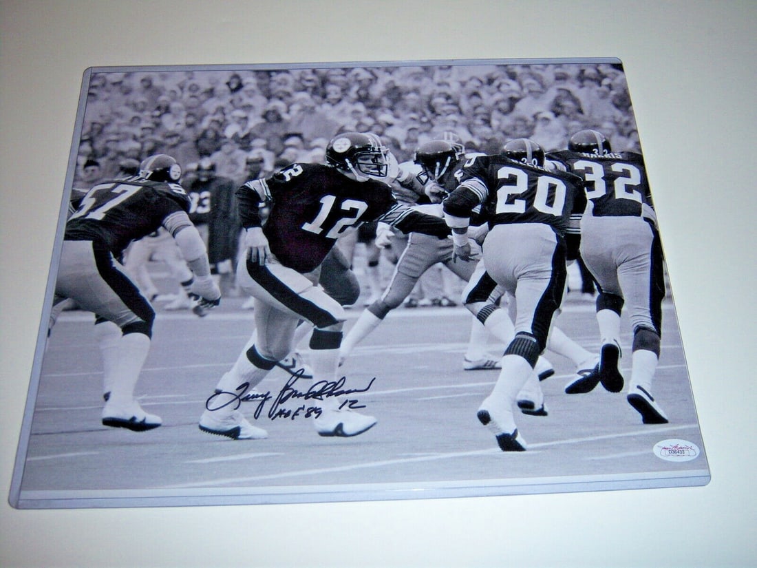11x14 Signed Photo Terry Bradshaw JSA Authenticated Pittsburgh Football Hall of Fame: 11x14 Signed Photo Terry Bradshaw JSA Authenticated Pittsburgh Football Hall of Fame This 11x14 photo features Terry Bradshaw of the Pittsburgh Steelers and has been hand-signed. The autograph is auth