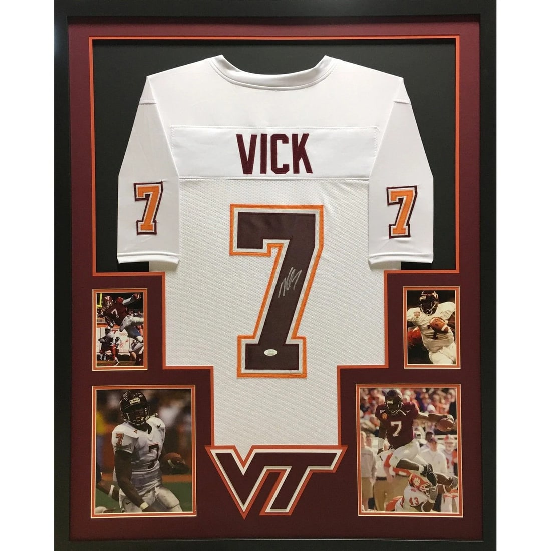 Michael Vick Autographed Framed Jersey Virginia Tech JSA Certified: Michael Vick Autographed Framed Jersey Virginia Tech JSA Certified This is a stunning autographed Michael Vick framed jersey, a must-have for any sports memorabilia collector. The jersey is authentica