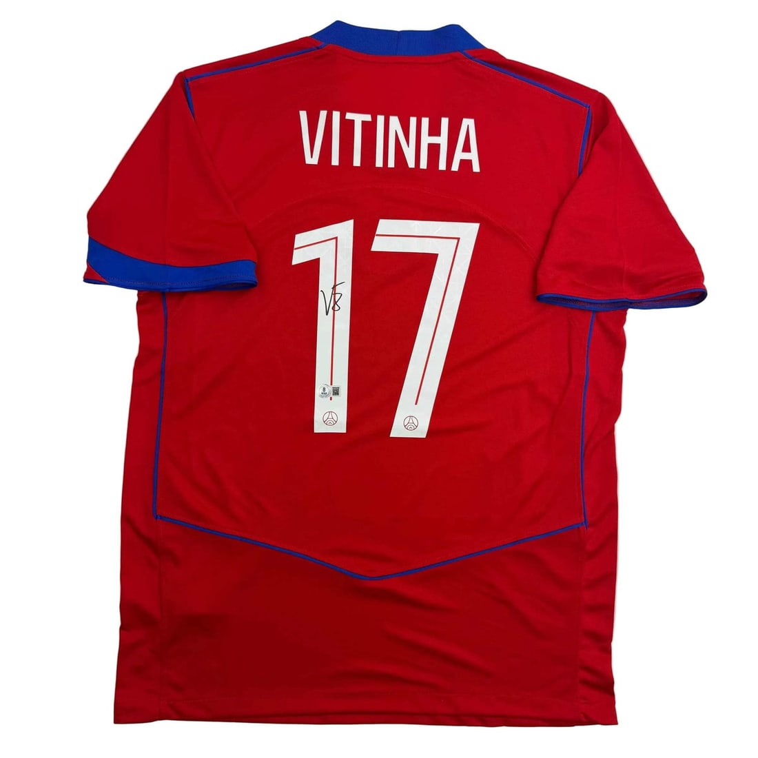 Vitinha Autographed PSG Red Jersey with Beckett Authentication: Vitinha Autographed PSG Red Jersey with Beckett Authentication This is an authentic autographed red jersey of Vitinha from Paris Saint-Germain (PSG), a prominent team in Ligue 1. The jersey features t