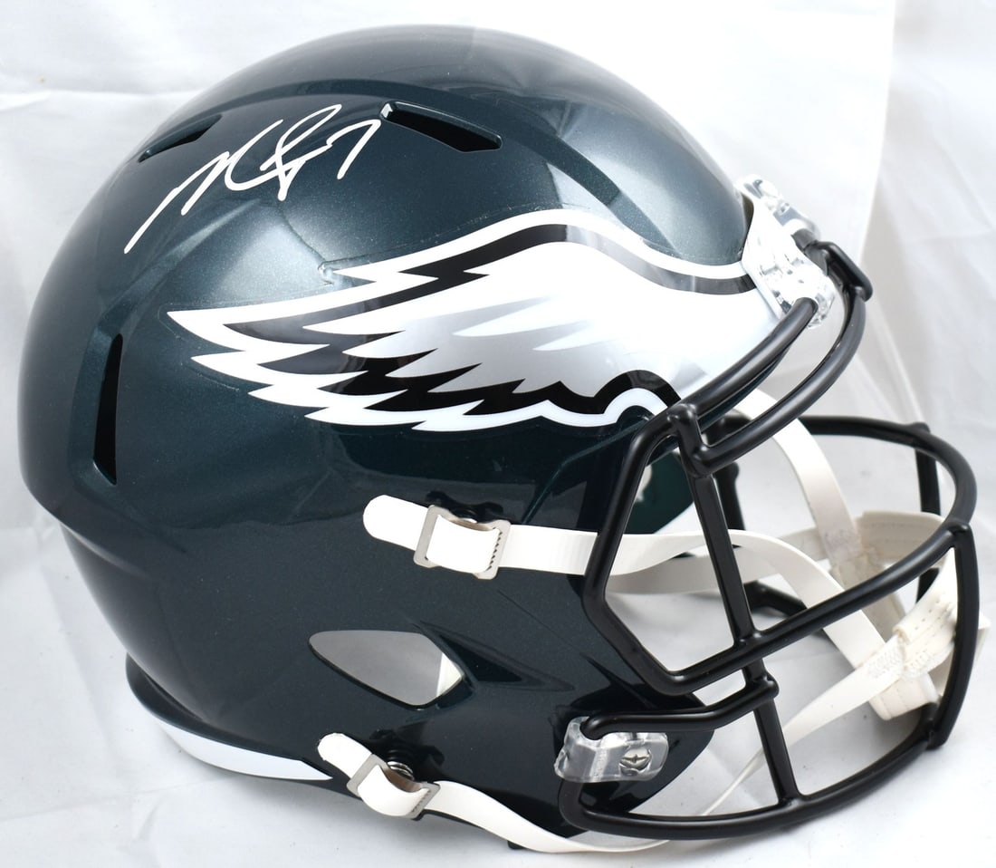 Philadelphia Eagles Full Size Speed Helmet Signed by Michael Vick with Beckett W Hologram: Philadelphia Eagles Full Size Speed Helmet Signed by Michael Vick with Beckett W Hologram This is a pre-owned Philadelphia Eagles full-size Speed helmet autographed by Michael Vick. The helmet is an o