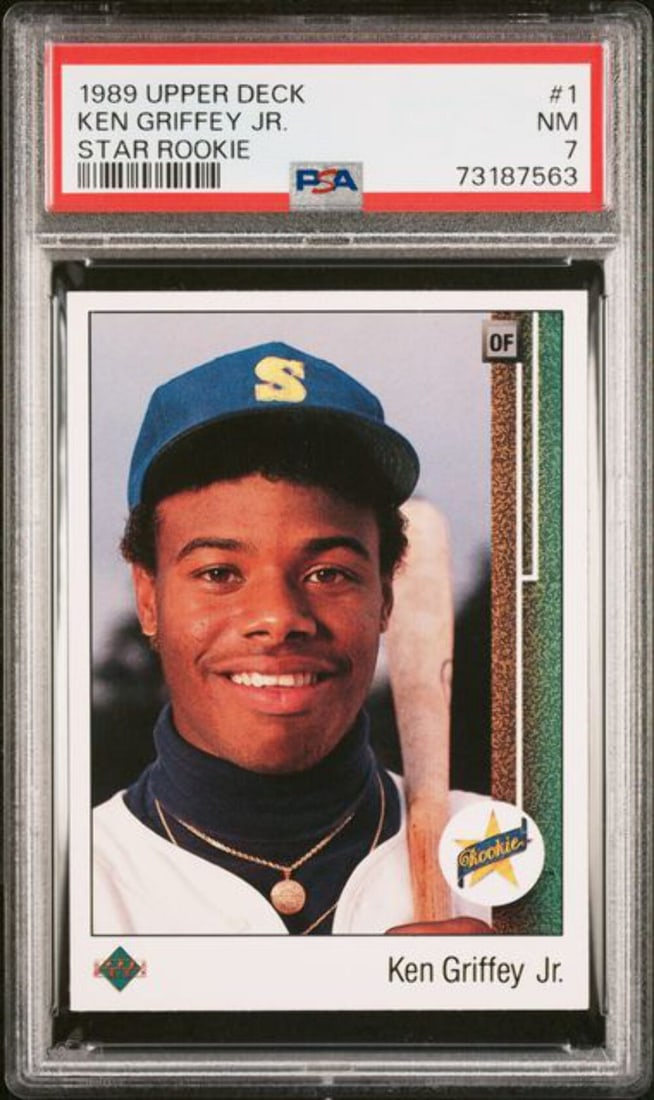 PSA 7 Ken Griffey Jr 1989 Upper Deck Star Rookie Card: PSA 7 Ken Griffey Jr 1989 Upper Deck Star Rookie Card Original 1989 Upper Deck Star Rookie Ken Griffey Jr. #THEKID rookie RC card, professionally encapsulated and graded by PSA. This pre-owned MLB tra