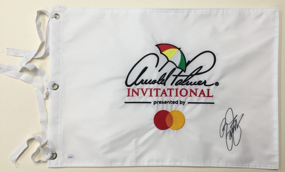 Rickie Fowler Signed Arnold Palmer Invitational Flag JSA Authenticated: Rickie Fowler Signed Arnold Palmer Invitational Flag JSA Authenticated Celebrate golf with this original Arnold Palmer Invitational pin flag, beautifully signed by PGA star Rickie Fowler. The autograp