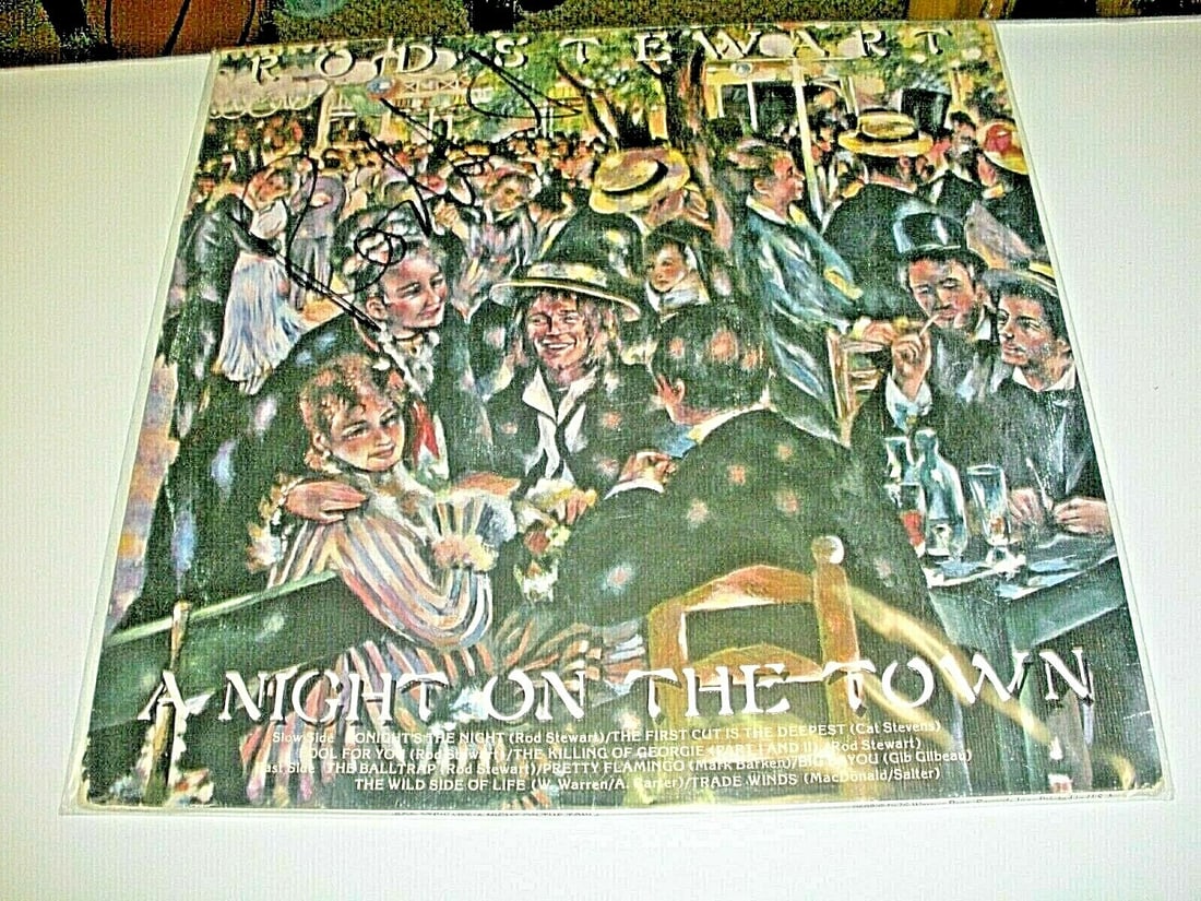 Signed Rod Stewart LP Album with COA for A Night On The Town: Signed Rod Stewart LP Album with COA for A Night On The Town This pre-owned original LP record album features Rod Stewart's "A Night on the Town." The album is signed and comes with a Todd Mueller Cer