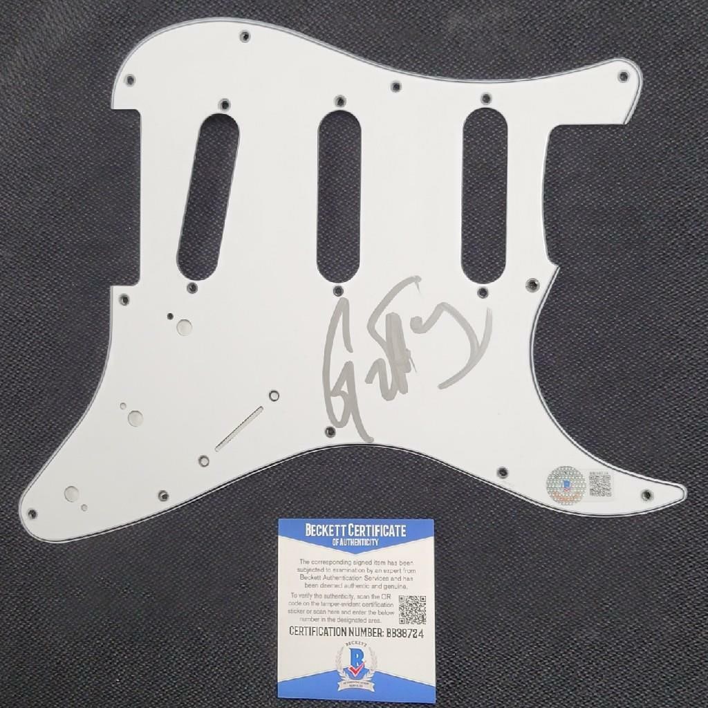 Electric Guitar Pickguard with G-Eazy Autograph Beckett Certificate: Electric Guitar Pickguard with G-Eazy Autograph Beckett Certificate This is an original electric guitar pickguard signed by rapper G-Eazy. The autograph has been authenticated by Beckett and comes wit
