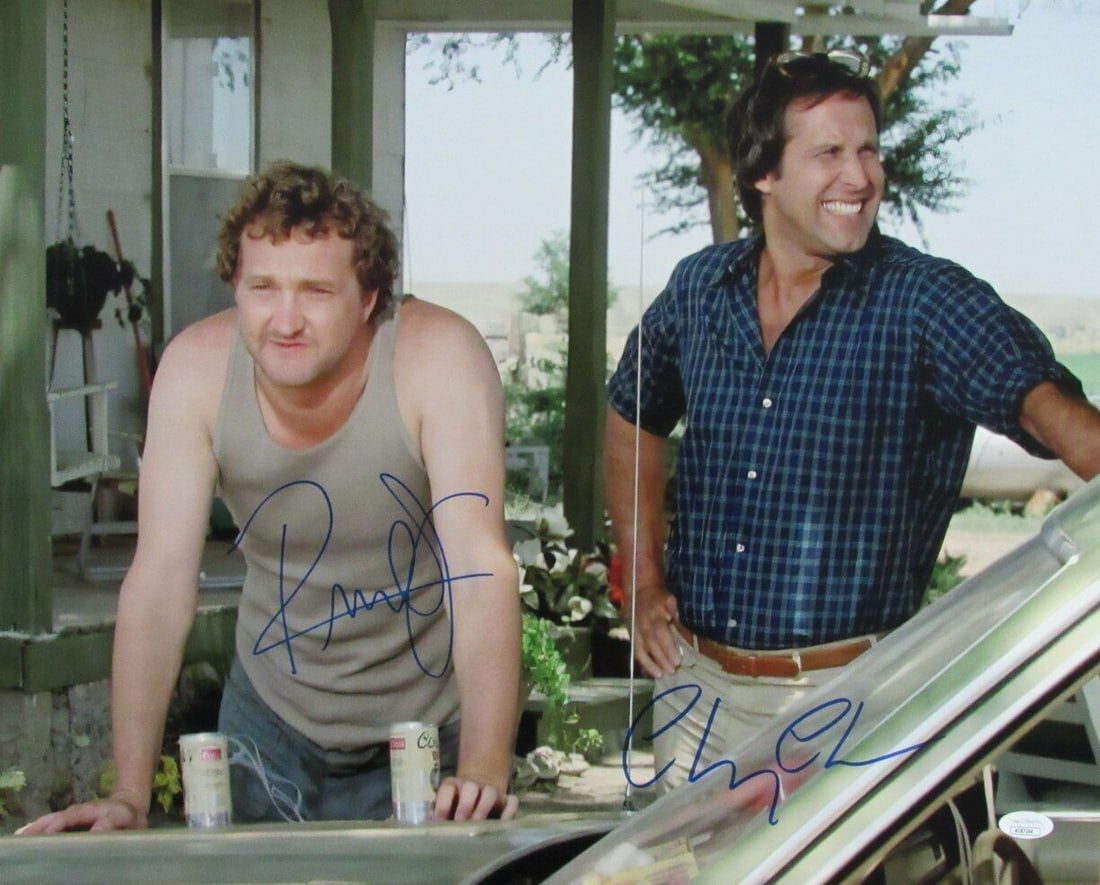 Chevy Chase Randy Quaid Dual-Autographed 16x20 Photo Vacation JSA Certified: Chevy Chase Randy Quaid Dual-Autographed 16x20 Photo Vacation JSA Certified This striking 16x20 photo features dual autographs from Chevy Chase and Randy Quaid, captured during their iconic roles in t