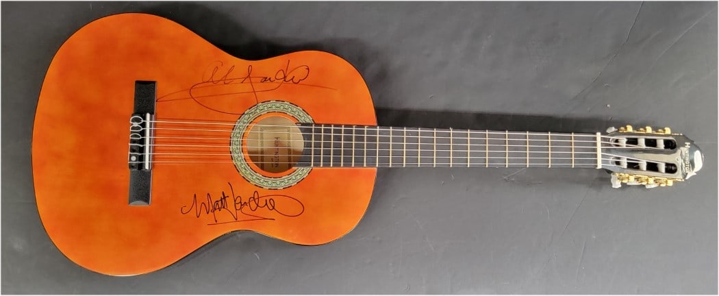 Autographed Acoustic Guitar Signed by Al and Matt Jardine with JSA Authentication: Autographed Acoustic Guitar Signed by Al and Matt Jardine with JSA Authentication This pre-owned acoustic guitar and guitar pick have been hand signed by Al Jardine and Matt Jardine. The autographs