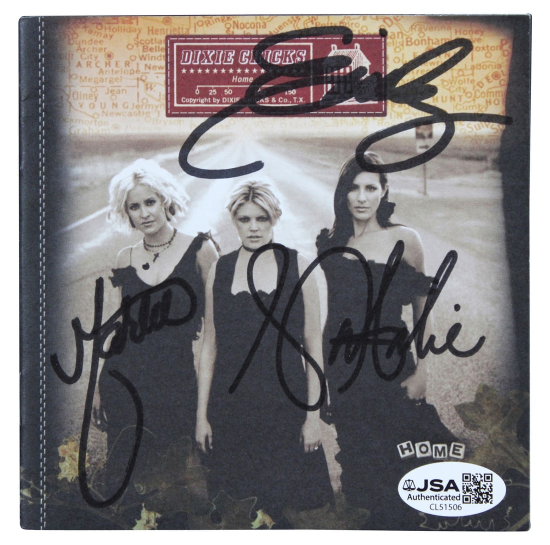 Dixie Chicks signed Home CD booklet JSA COA: Dixie Chicks signed Home CD booklet JSA COA This is an original "Home" CD booklet signed by Natalie Maines, Martie Maguire, and Emily Strayer of the Dixie Chicks. The autographs have been authenticate