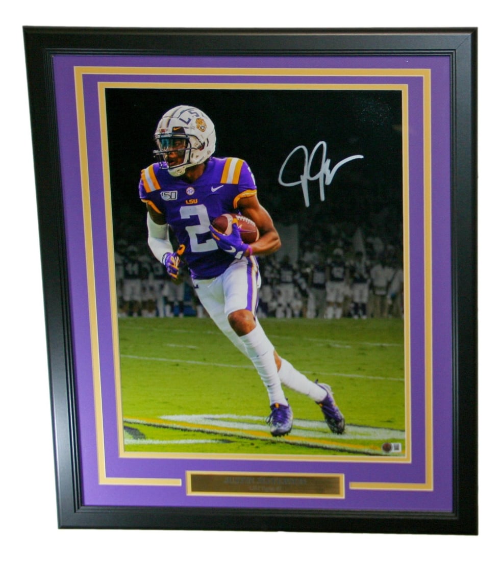 Justin Jefferson Autographed 16x20 LSU Tigers Photo Framed Beckett BAS Certified: Justin Jefferson Autographed 16x20 LSU Tigers Photo Framed Beckett BAS Certified Capture the spirit of college football with this stunning framed photo of Justin Jefferson, featuring his autograph. Th