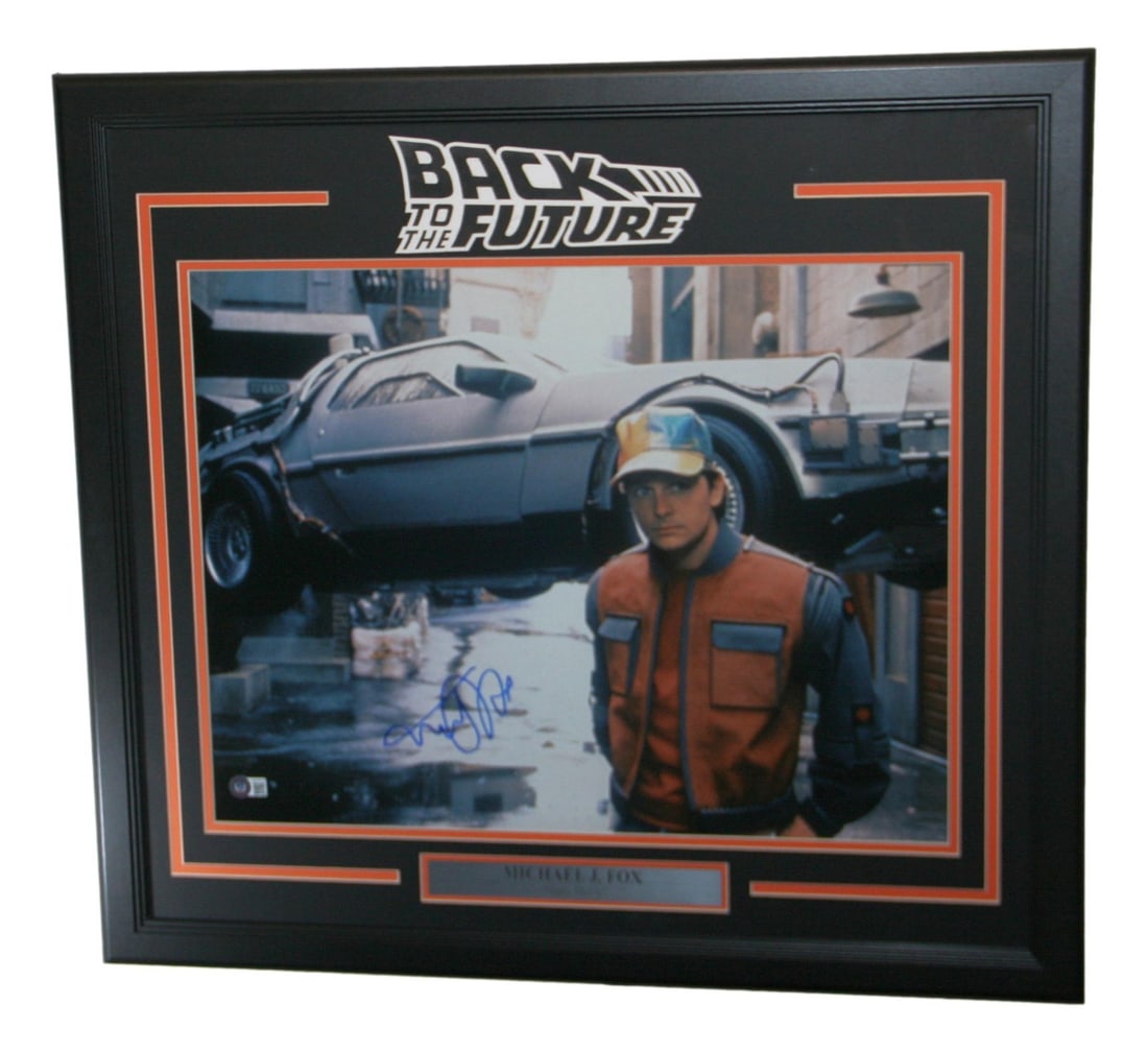 Michael J Fox Signed Framed 16x20 Back To The Future Photo Beckett: Michael J Fox Signed Framed 16x20 Back To The Future Photo Beckett This stunning framed photograph features Michael J. Fox as Marty McFly from the iconic movie "Back To The Future." The 16x20 photo is