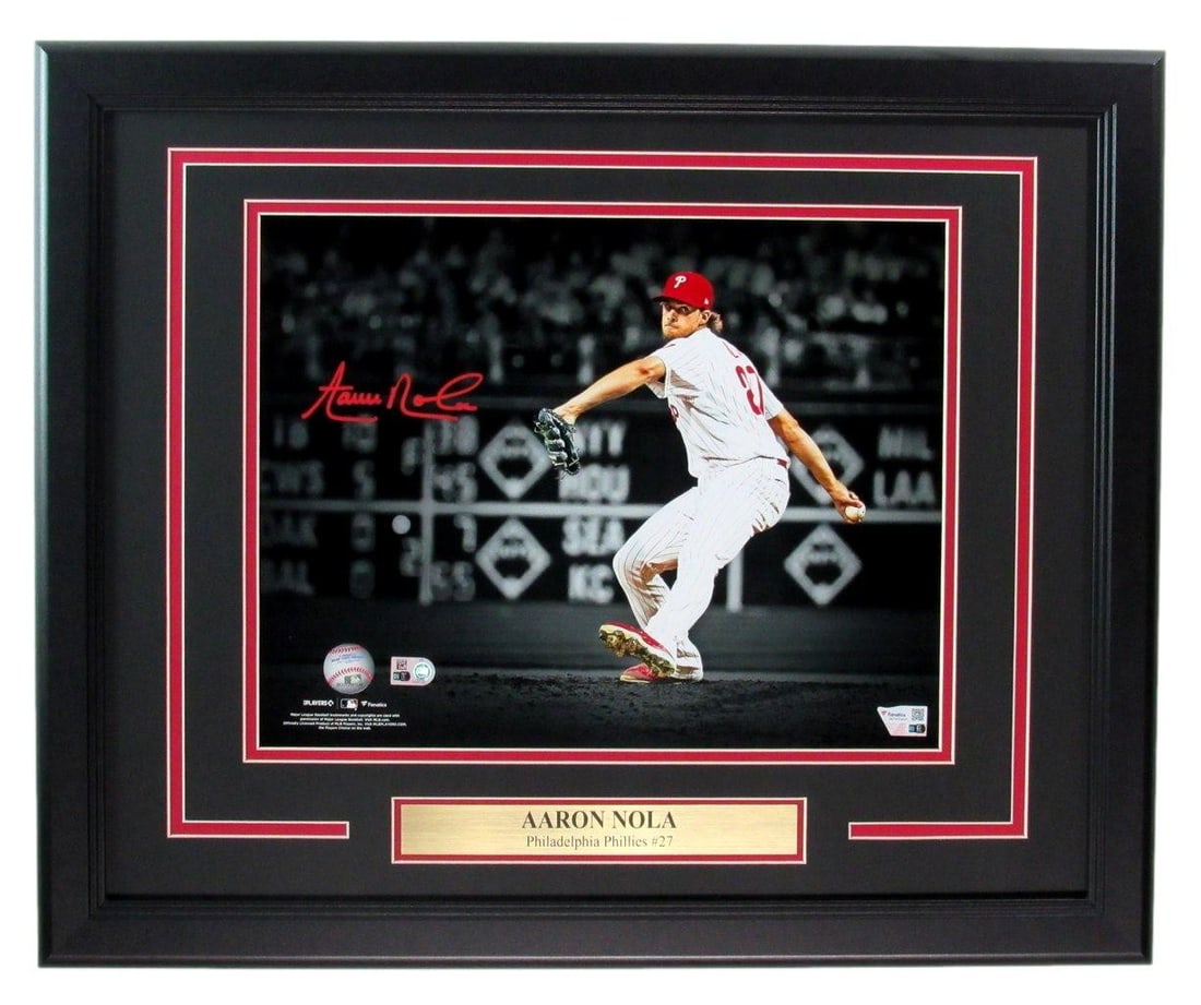 Aaron Nola Autographed 11x14 Framed Photo Philadelphia Phillies Fanatics: Aaron Nola Autographed 11x14 Framed Photo Philadelphia Phillies Fanatics This item features a signed 11x14 photo of Aaron Nola, a prominent player for the Philadelphia Phillies, beautifully framed for