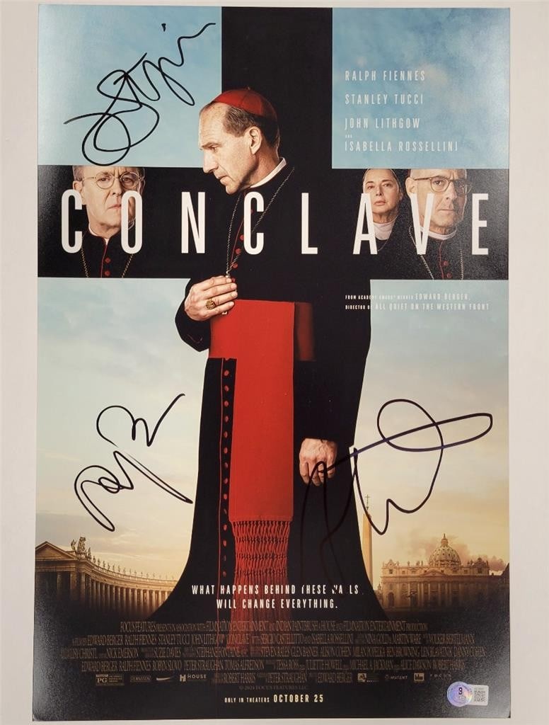 12x18 Conclave Cast Signed Photo with Fiennes Tucci Lithgow Beckett Authenticated: 12x18 Conclave Cast Signed Photo with Fiennes Tucci Lithgow Beckett Authenticated This original 12x18 photograph poster features signatures from three members of the Conclave cast: Ralph Fiennes, Stan