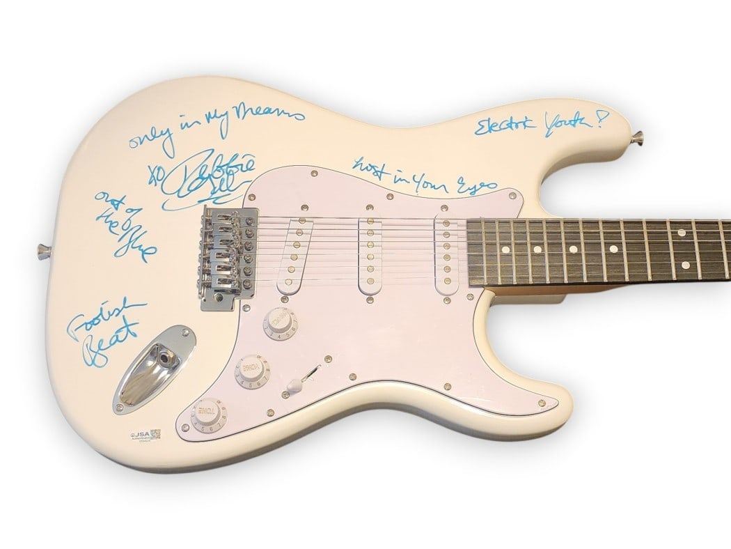Electric Guitar Autographed by Debbie Gibson with Song Inscriptions JSA Authenticated: Electric Guitar Autographed by Debbie Gibson with Song Inscriptions JSA Authenticated This electric guitar has been autographed by Debbie Gibson and is inscribed with five different song titles, inclu