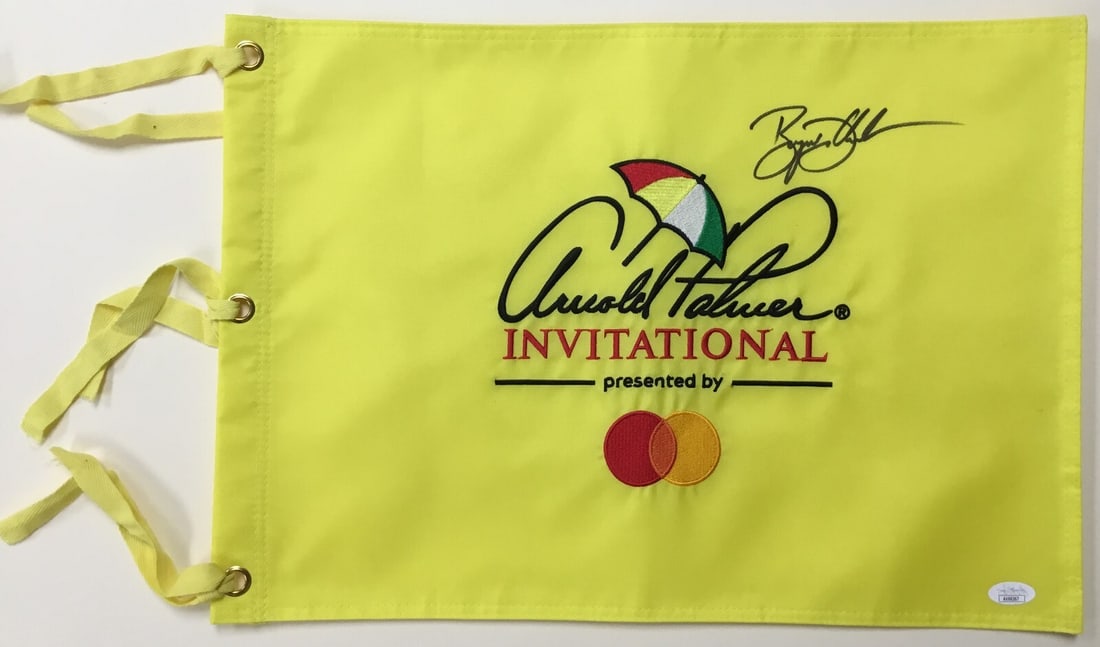 Bryson DeChambeau Signed Arnold Palmer Invitational Flag JSA Authenticated: Bryson DeChambeau Signed Arnold Palmer Invitational Flag JSA Authenticated This is an official Arnold Palmer Invitational pin flag, beautifully signed by PGA star Bryson DeChambeau. The autograph has 