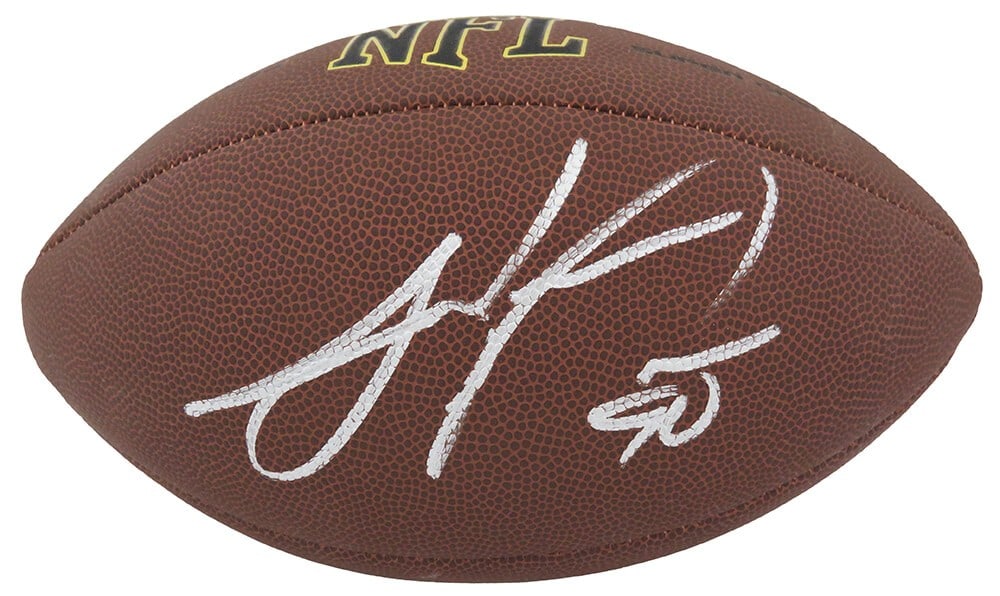 Julius Peppers Signed Wilson NFL Football with COA: Julius Peppers Signed Wilson NFL Football with COA This is a full-size NFL football signed by Julius Peppers, a legendary player for the Carolina Panthers. The ball features a Wilson Super Grip design