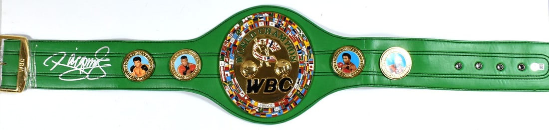 Manny Pacquiao Signed WBC Replica Belt Beckett Hologram Silver: Manny Pacquiao Signed WBC Replica Belt Beckett Hologram Silver This is a WBC replica belt autographed by Manny Pacquiao. The belt features a Beckett Witnessed hologram for added authenticity. It is a 
