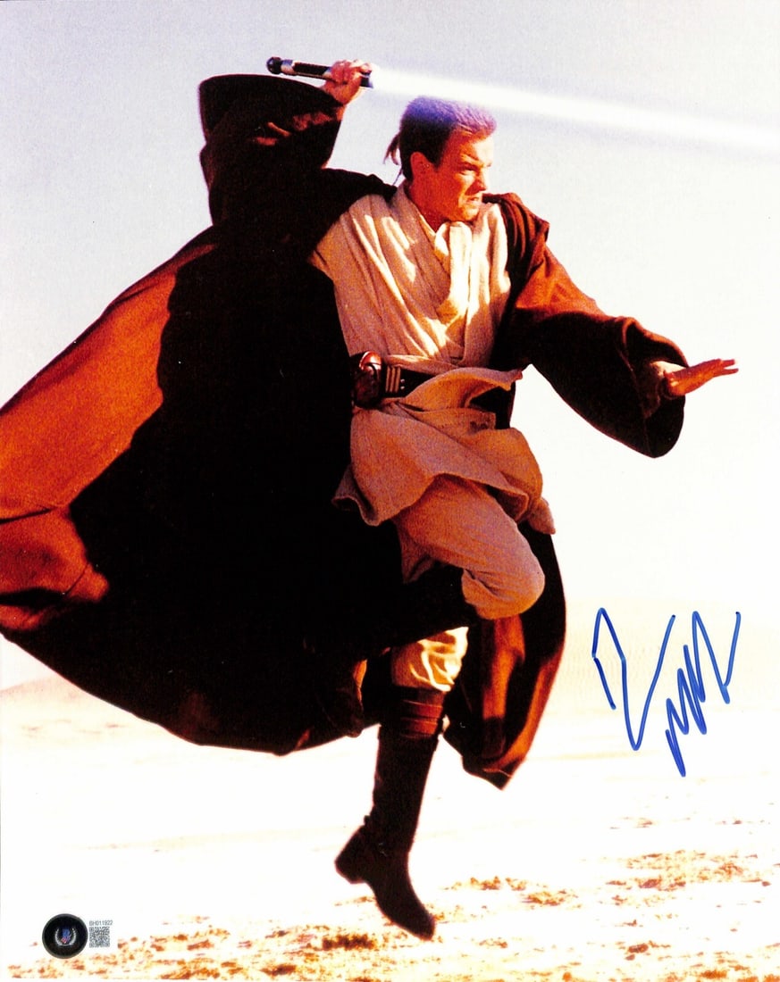 Ewan McGregor Signed 11x14 Star Wars Photo Beckett Authenticated: Ewan McGregor Signed 11x14 Star Wars Photo Beckett Authenticated This is an autographed 11x14 photograph featuring Ewan McGregor as Obi-Wan Kenobi in Star Wars: The Phantom Menace. The photo is signed