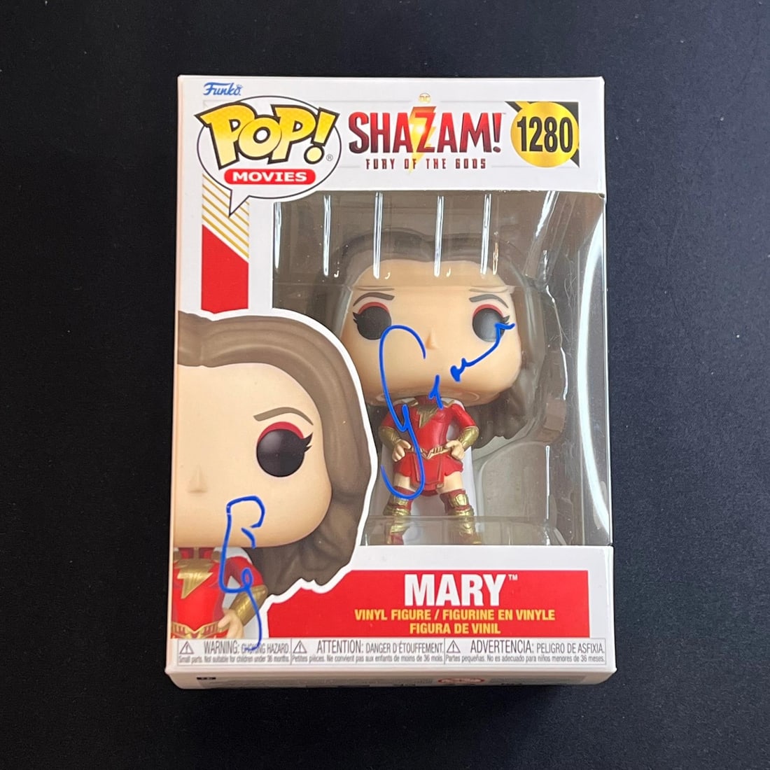 Grace Caroline Currey Signed Funko Pop #1280 PSA/DNA Shazam Collectible: Grace Caroline Currey Signed Funko Pop #1280 PSA/DNA Shazam Collectible This Funko Pop figure features the signature of Grace Caroline Currey, known for her role as Mary in Shazam: Fury of the Gods. T