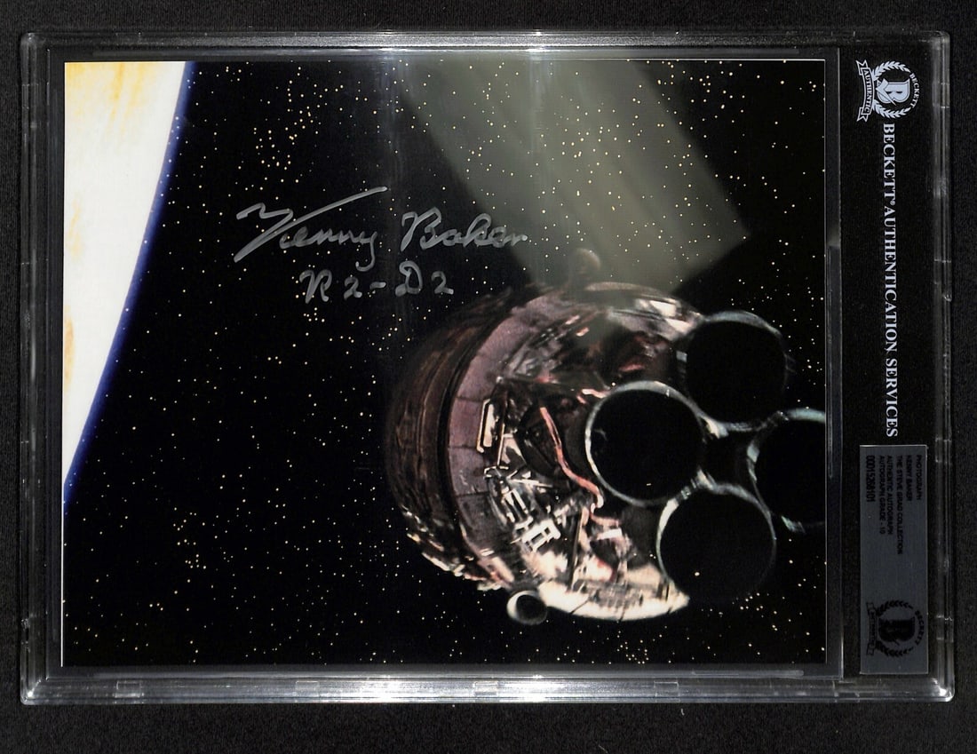 Kenny Baker Signed R2D2 8x10 Photo Auto 10 Beckett Authentication: Kenny Baker Signed R2D2 8x10 Photo Auto 10 Beckett Authentication This stunning autographed 8x10 color photograph features Kenny Baker, the actor behind R2-D2 from Star Wars. Signed in blue permanent 