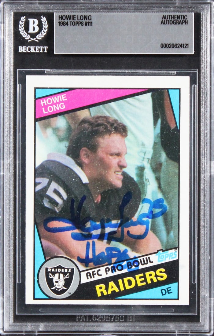Beckett authenticated Howie Long signed 1984 Topps 111 Raiders card HOF 00: Beckett authenticated Howie Long signed 1984 Topps 111 Raiders card HOF 00 Autographed 1984 Topps #111 card personally signed by Howie Long and inscribed "HOF 00." This original football card is slabb