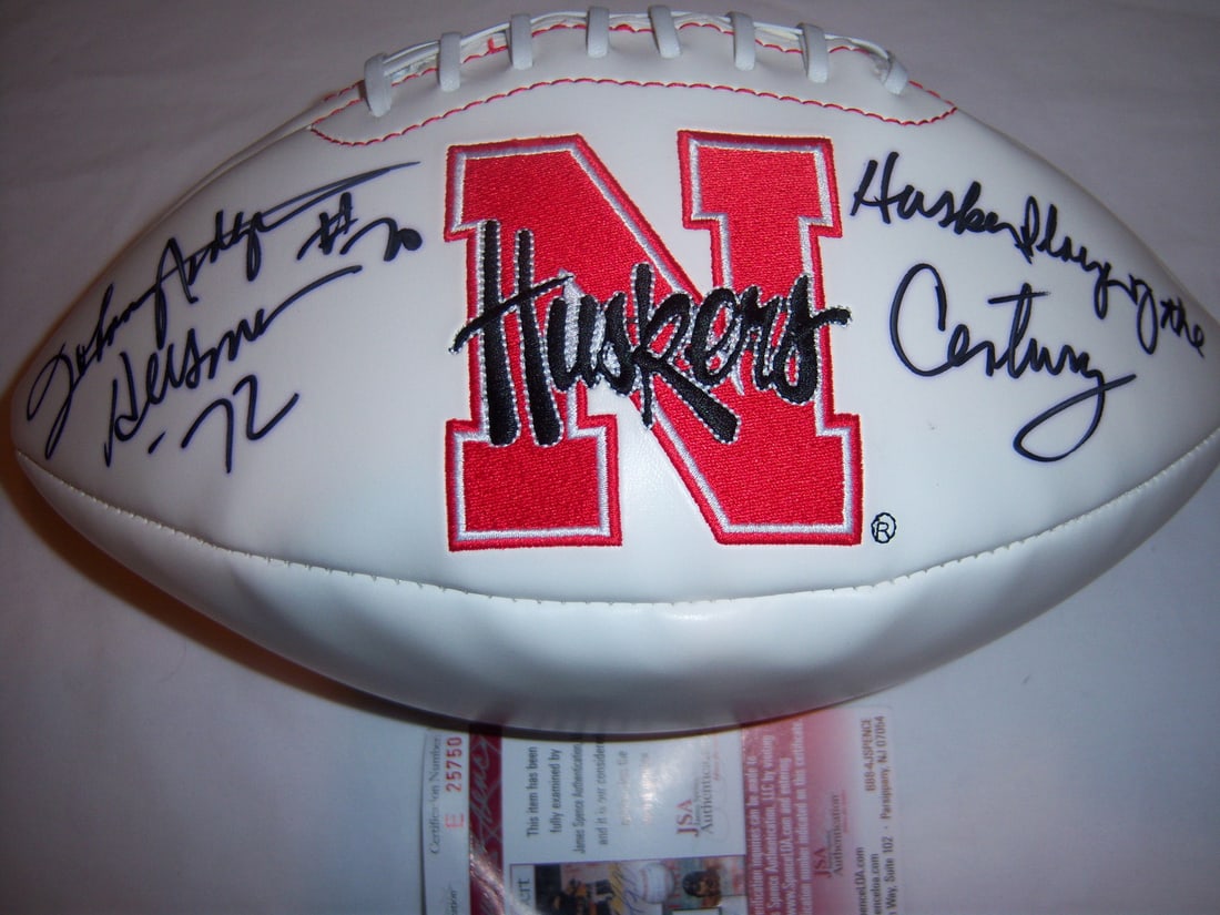 Football autographed by Nebraska Heisman winner Johnny Rodgers with JSACOA authentication (1 of 2)