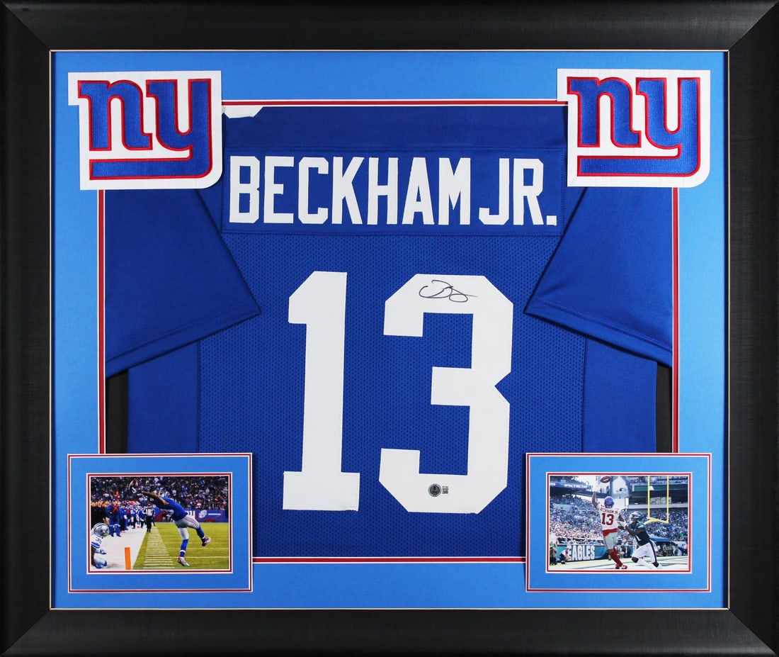 Framed Odell Beckham Jr. signed New York Giants blue jersey BAS witnessed: Framed Odell Beckham Jr. signed New York Giants blue jersey BAS witnessed This authentic blue pro style jersey has been personally signed by Odell Beckham Jr. of the New York Giants. The jersey is pro