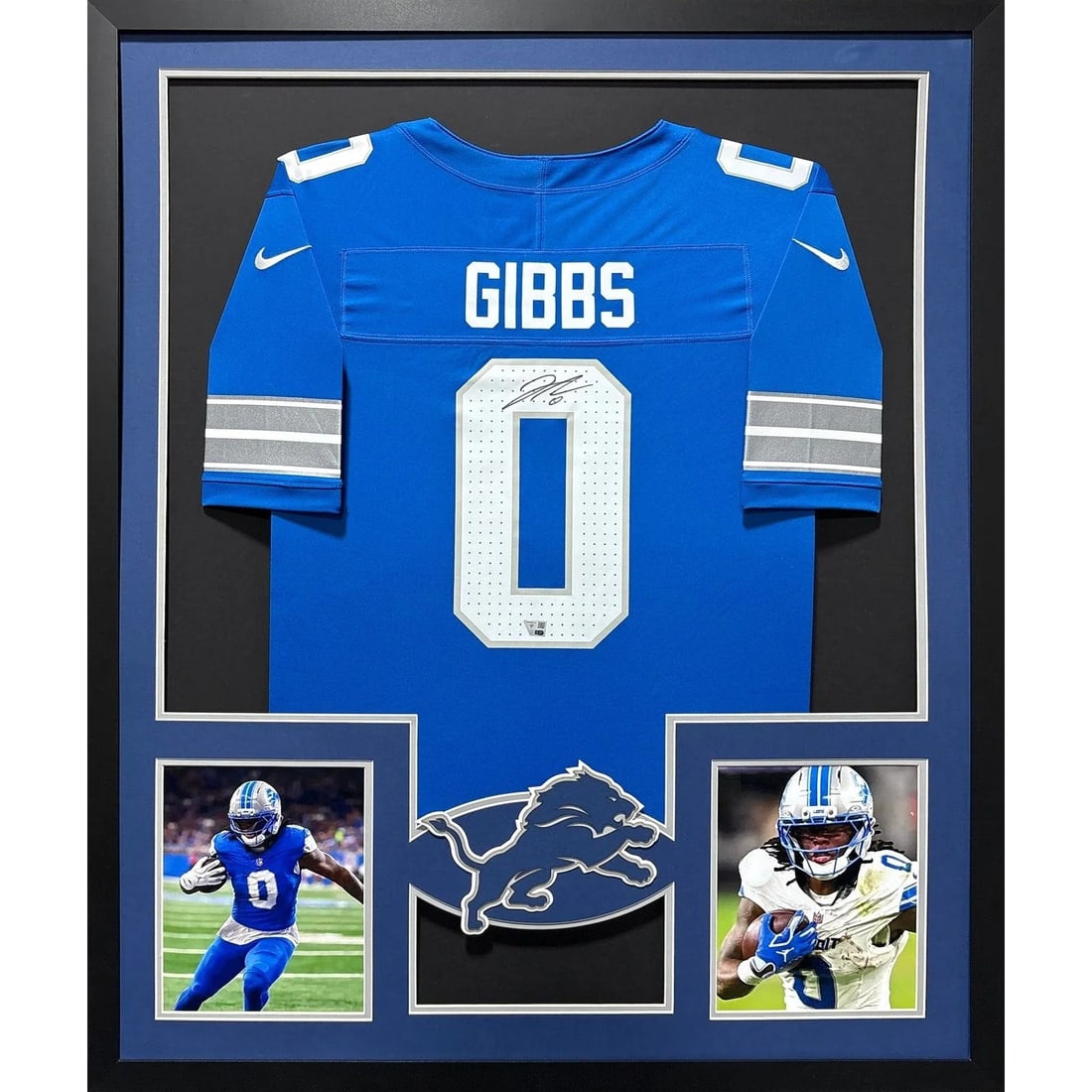 Framed Detroit Lions Jahmyr Gibbs Jersey Signed With Fanatics Authentication: Framed Detroit Lions Jahmyr Gibbs Jersey Signed With Fanatics Authentication This display features a framed Detroit Lions jersey autographed by Jahmyr Gibbs. The jersey is authenticated by Fanatics an