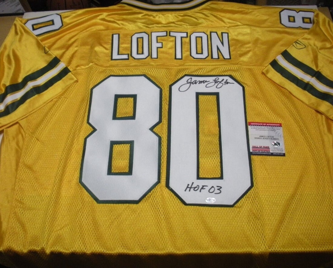 James Lofton Autographed Green Bay Packers Reebok Jersey With COA: James Lofton Autographed Green Bay Packers Reebok Jersey With COA This is an official licensed Reebok Green Bay Packers jersey signed by James Lofton. The jersey comes with a certificate of authentici