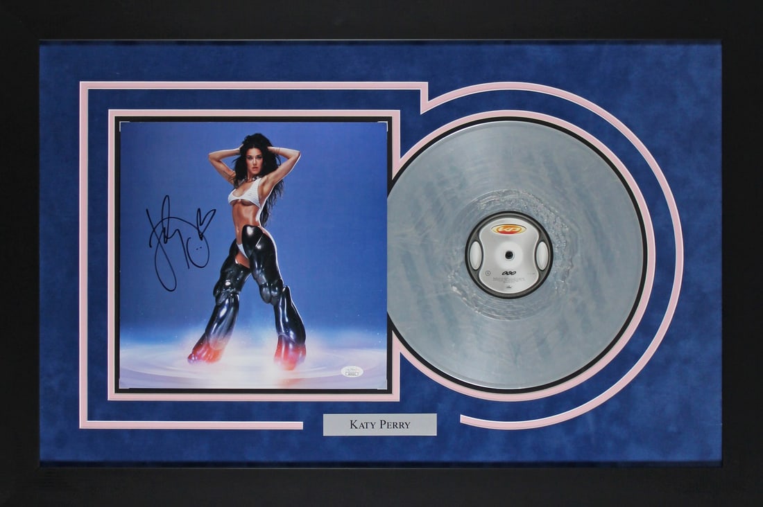Framed Katy Perry Signed 143 Album Flat with Vinyl JSA COA: Framed Katy Perry Signed 143 Album Flat with Vinyl JSA COA Authentic signed and framed 143 album flat with vinyl, personally signed by Katy Perry. This original record display includes JSA authenticat