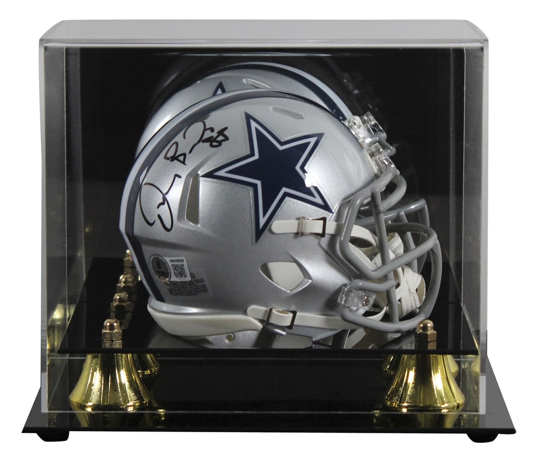 Dez Bryant Signed Dallas Cowboys Mini Helmet With Display Case BAS Witness: Dez Bryant Signed Dallas Cowboys Mini Helmet With Display Case BAS Witness This Dallas Cowboys Speed Mini Helmet has been personally signed by Dez Bryant and comes with a UV mirrored back acrylic disp
