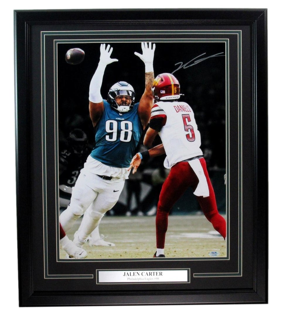 Framed 16x20 Jalen Carter autographed Eagles photo PSA DNA: Framed 16x20 Jalen Carter autographed Eagles photo PSA DNA This framed 16x20 photograph features the authentic signature of Jalen Carter from the Philadelphia Eagles. The photo is professionally authe