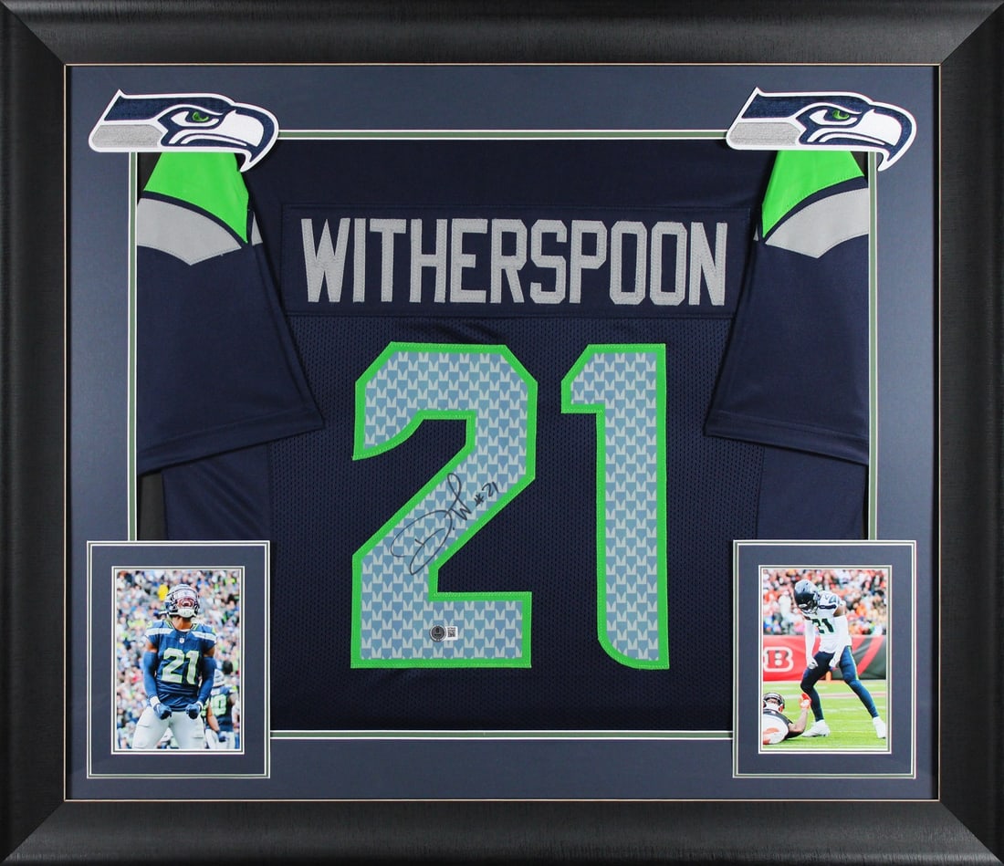 Devon Witherspoon Signed Navy Pro Style Framed Jersey BAS Witnessed Seattle Seahawks: Devon Witherspoon Signed Navy Pro Style Framed Jersey BAS Witnessed Seattle Seahawks This authentic navy pro style framed jersey is personally signed by Devon Witherspoon of the Seattle Seahawks. It f