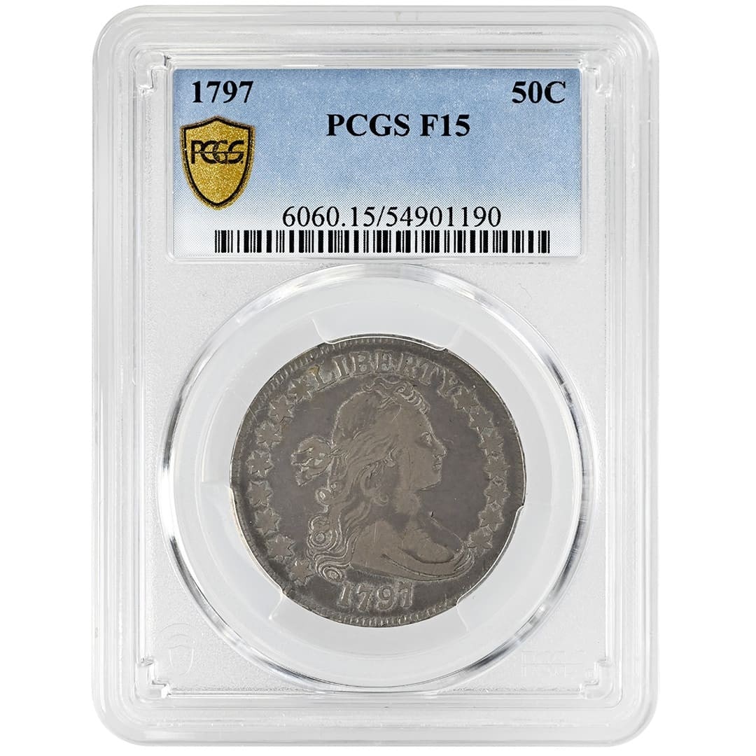 PCGS F15 1797 50C Draped Bust Half Dollar Small Eagle: PCGS F15 1797 50C Draped Bust Half Dollar Small Eagle 1797 Draped Bust Half Dollar Small Eagle, graded PCGS F15. This pre-owned United States 50C coin is a key date rarity. Specifications Year: 1797 D