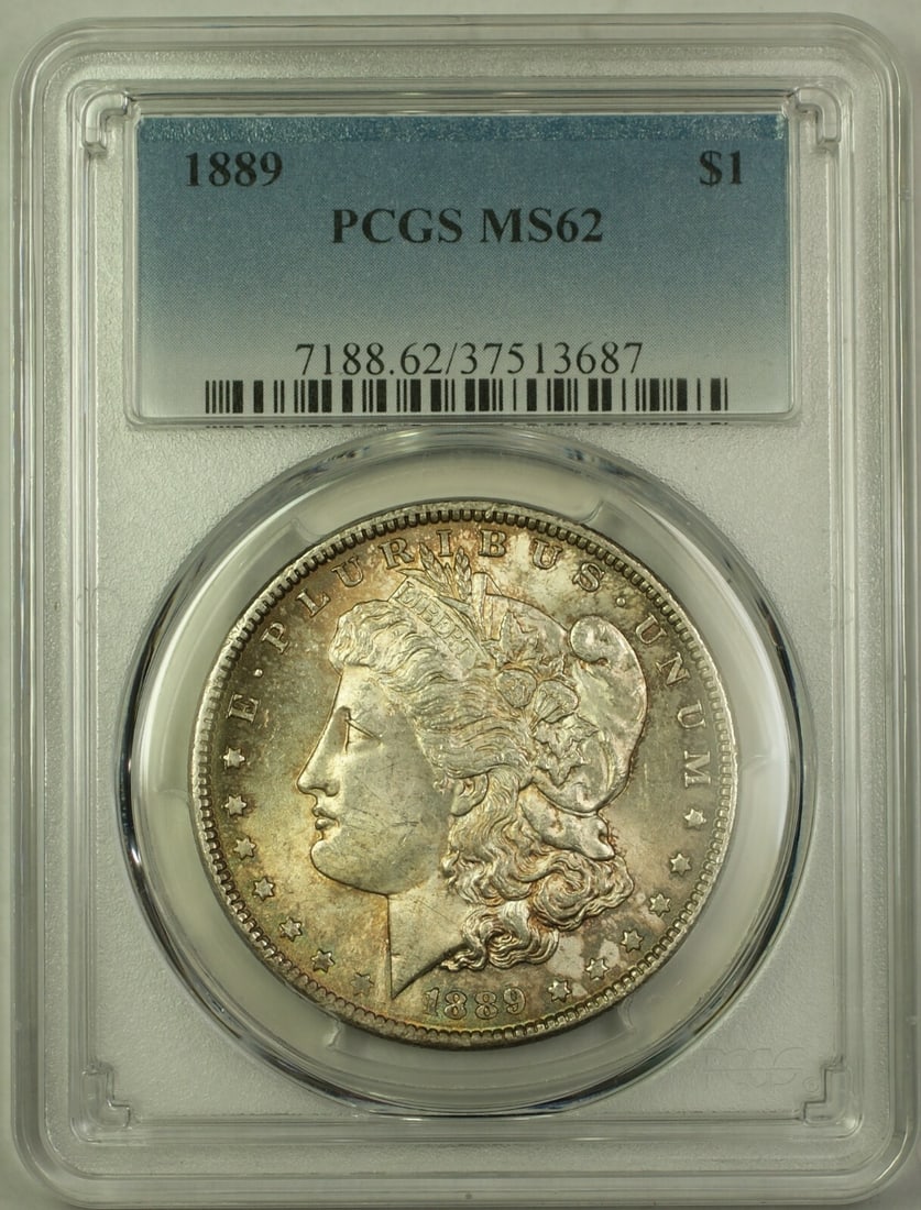 PCGS MS62 1889 Morgan Silver Dollar with Dual Toning: PCGS MS62 1889 Morgan Silver Dollar with Dual Toning 1889 Morgan Silver Dollar $1 certified by PCGS and graded MS-62. This uncirculated silver coin features attractive dual-sided toning, with cyan and