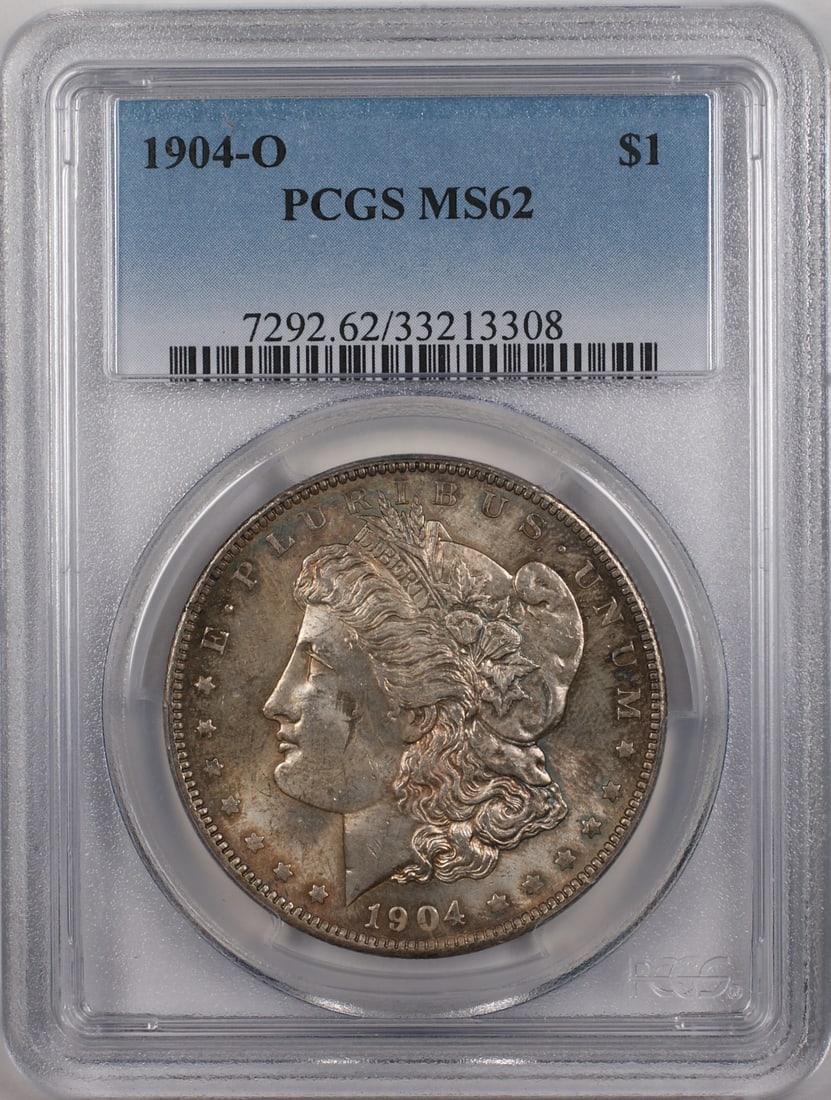 PCGS MS 62 1904 O Morgan Silver Dollar: PCGS MS 62 1904 O Morgan Silver Dollar 1904-O Morgan Silver Dollar $1 coin graded MS 62 by PCGS. This uncirculated United States coin is composed of silver and is offered in pre-owned condition. Speci