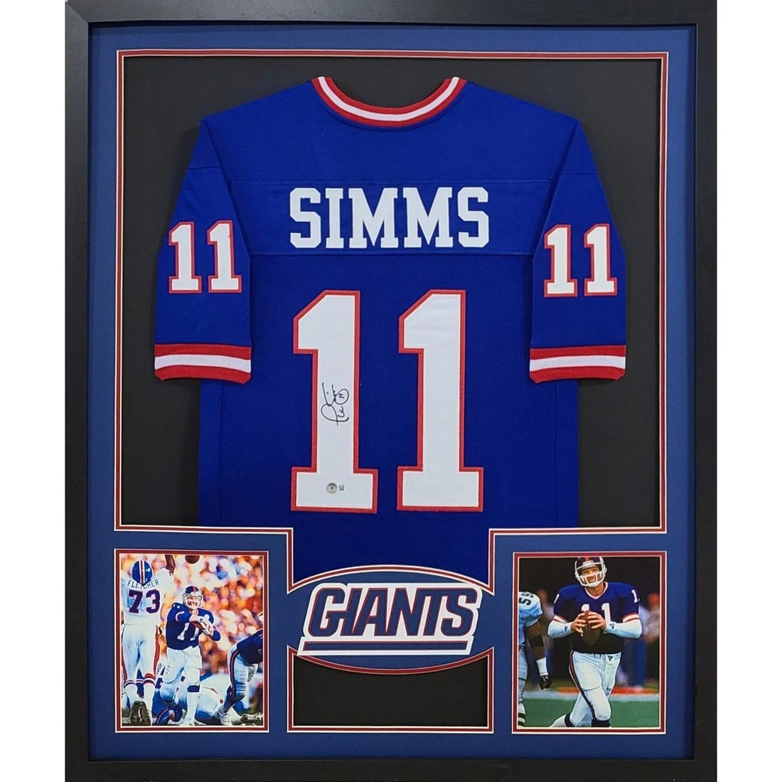 Phil Simms Signed Jersey Framed New York Giants Beckett Authenticated: Phil Simms Signed Jersey Framed New York Giants Beckett Authenticated This is a professionally framed autographed jersey of Phil Simms, a celebrated player of the New York Giants. The jersey comes wit