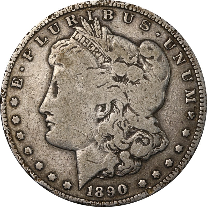 1890 CC Morgan Silver Dollar Circulated Silver Coin: 1890 CC Morgan Silver Dollar Circulated Silver Coin 1890-CC Morgan Silver Dollar with rim issues. This pre-owned coin is uncertified, circulated, and struck in silver. Specifications Coin Type: Morgan