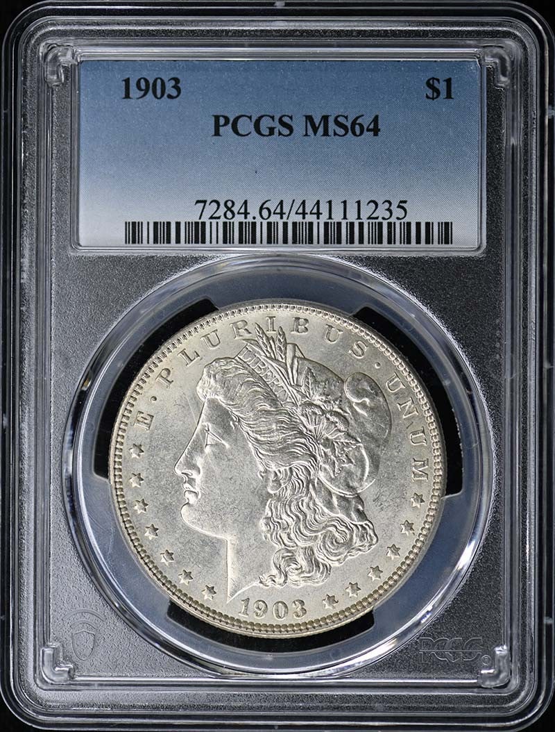 PCGS MS64 1903 Morgan Silver Dollar $1: PCGS MS64 1903 Morgan Silver Dollar $1 1903 Morgan Dollar certified by PCGS and graded MS64. This pre-owned coin is uncirculated and was minted in Philadelphia. Specifications Coin Type: Morgan Dollar