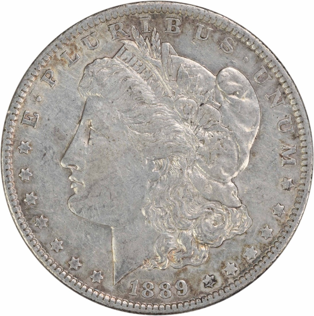 1889 New Orleans Morgan Dollar 90 Percent Silver EF Uncertified Coin: 1889 New Orleans Morgan Dollar 90 Percent Silver EF Uncertified Coin This 1889-O Morgan Silver Dollar was minted in New Orleans and features a composition of 90% silver and 10% copper. Designed by Geo