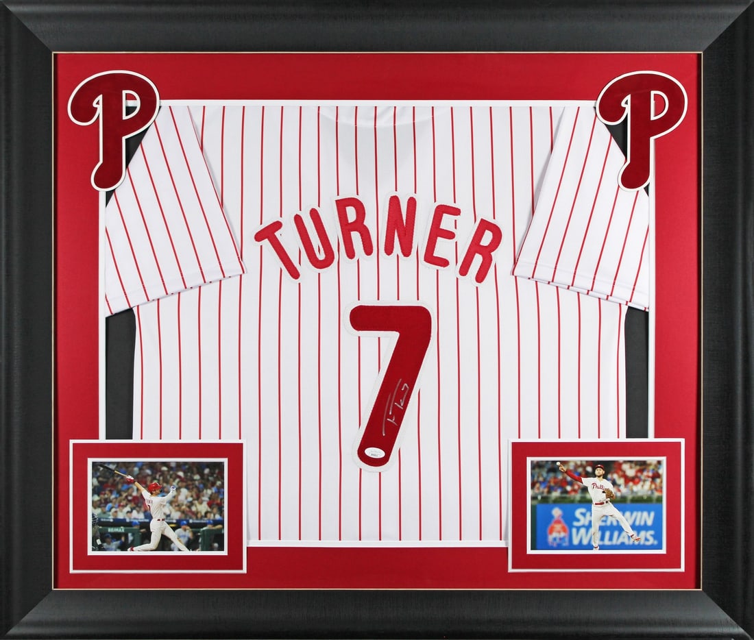 Framed white pinstripe jersey signed by Trea Turner JSA authenticated: Framed white pinstripe jersey signed by Trea Turner JSA authenticated Autographed white pinstripe pro style framed jersey personally signed by Trea Turner of the Philladelphia Phillies. It is an origi